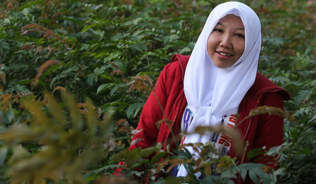 Abused former domestic helper Erwiana Sulistyaningsih, pictured in Victoria Park in 2016. Photo: Felix Wong Abused former domestic helper Erwiana Sulistyaningsih, pictured in Victoria Park in 2016. Photo: Felix Wong
