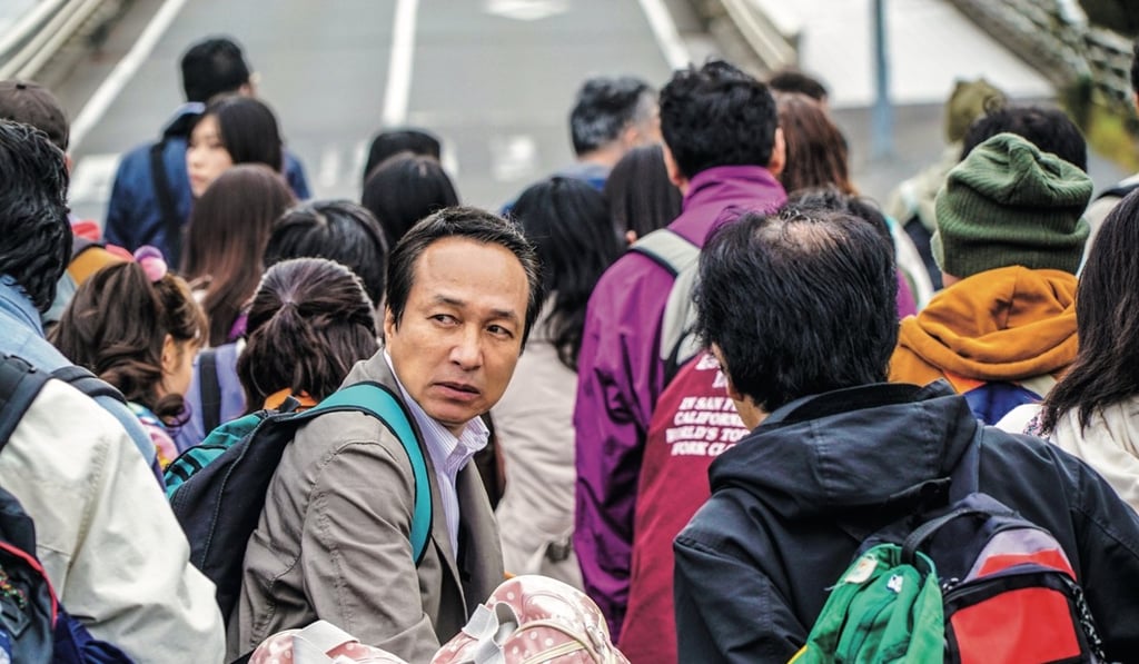 Fumiyo Kohinata in a still from the film Survival Family.