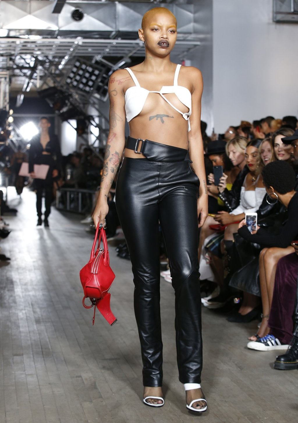Models walk the runway at the Helmut Lang Seen by Shayne Oliver show during New York Fashion Week. Photo: AP Models walk the runway at the Helmut Lang Seen by Shayne Oliver show during New York Fashion Week. Photo: AP