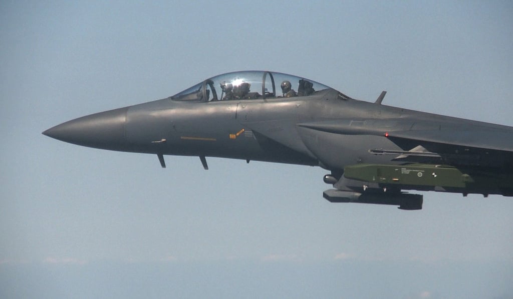 A South Korean F-15K fighter jet flies with a Taurus missile. Photo: AP