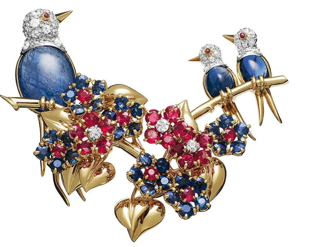 Van Cleef & Arpels’ three birds clip made with platinum, yellow gold, sapphires, rubies and diamonds.