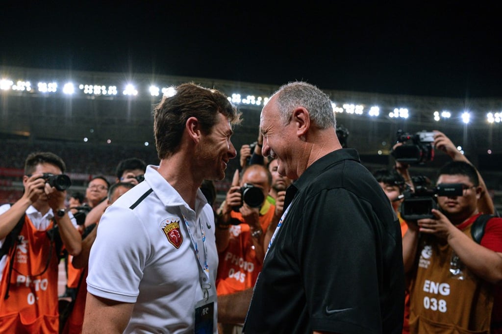 Andre Villas-Boas with Guangzhou coach Luiz Felipe Scolari in August. Photo: AFP Andre Villas-Boas with Guangzhou coach Luiz Felipe Scolari in August. Photo: AFP
