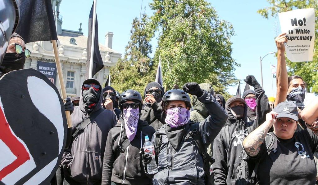 Antifa members and counter protesters gather to oppose a rightwing No-To-Marxism rally on August 27 in Berkeley, California. /Photo: AFP