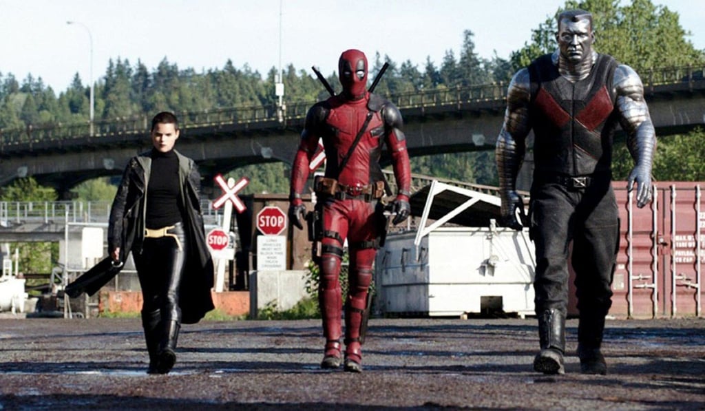 Deadpool (Ryan Reynolds, centre) turns to temporary sidekicks Negasonic Teenage Warhead (Brianna Hildebrand) and Colossus (voiced by Stefan Kapicic) for help in Deadpool. Photo: Fox