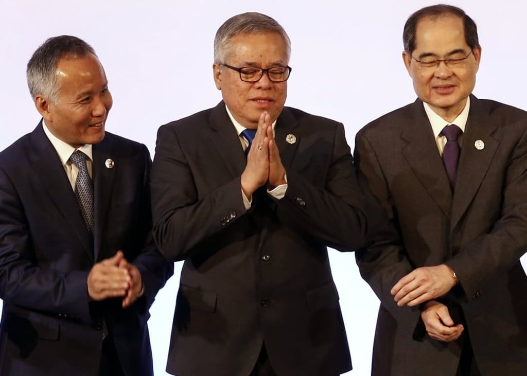 Posing ahead of the 49th Asean economic ministers’ meeting are (from left) Tran Quoc Khanh, Vietnam’s deputy minister of Industry and Trade, Philippine Trade and Industry secretary Ramon Lopez and Singapore’s Trade and Industry minister Lim Hng Kiang, in Manila on September 7. Photo: EPA-EFE Posing ahead of the 49th Asean economic ministers’ meeting are (from left) Tran Quoc Khanh, Vietnam’s deputy minister of Industry and Trade, Philippine Trade and Industry secretary Ramon Lopez and Singapore’s Trade and Industry minister Lim Hng Kiang, in Manila on September 7. Photo: EPA-EFE