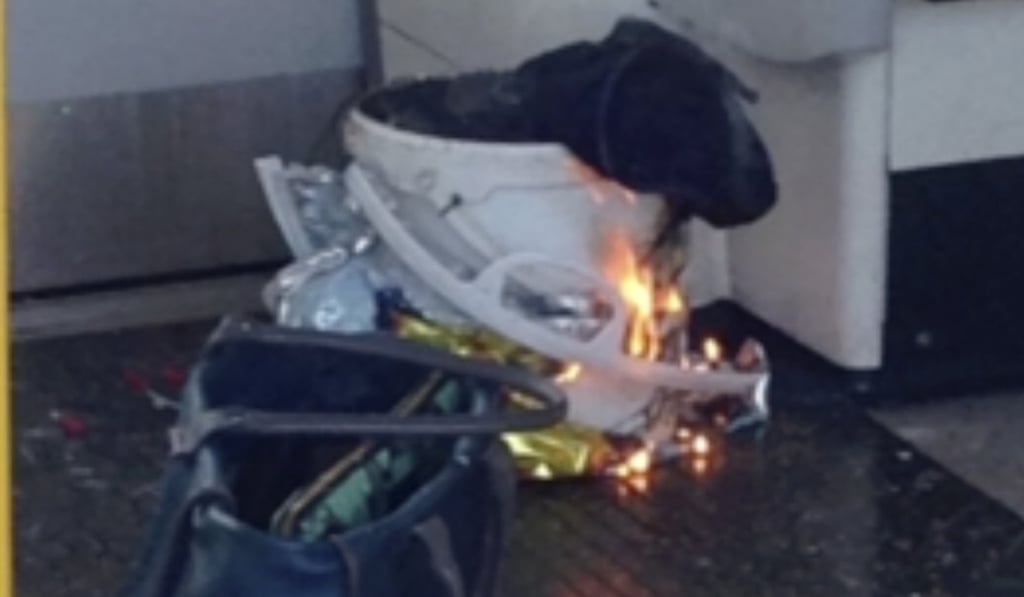 The white bucket smouldering in the train carriage after the bomb detonated in a London train. Photo: AP The white bucket smouldering in the train carriage after the bomb detonated in a London train. Photo: AP