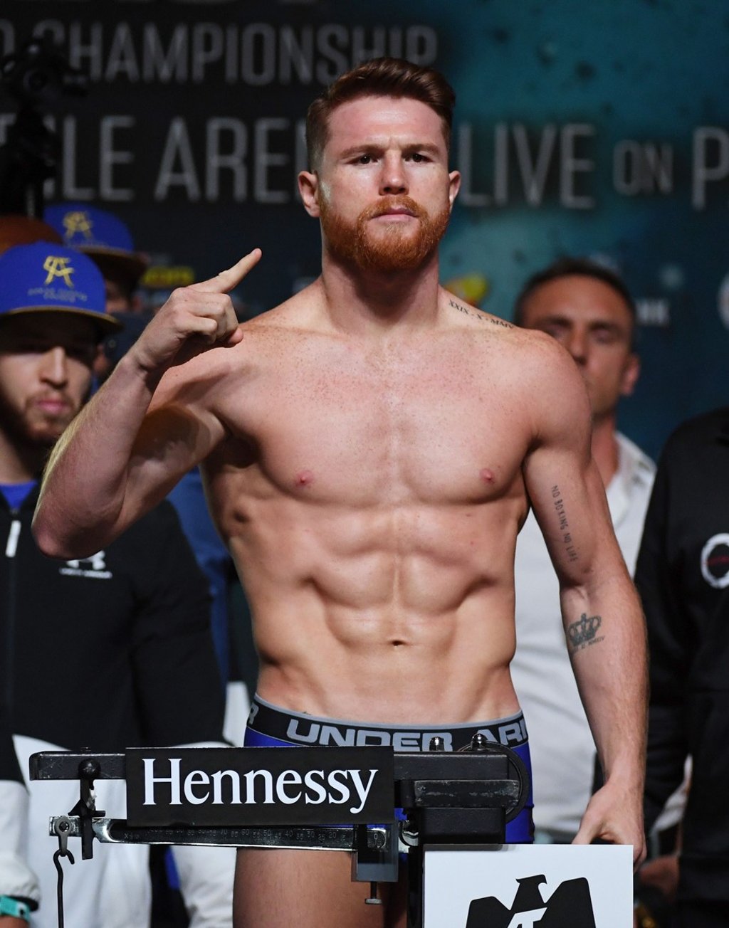 Canelo Alvarez poses on the scale. Photo: AFP Canelo Alvarez poses on the scale. Photo: AFP