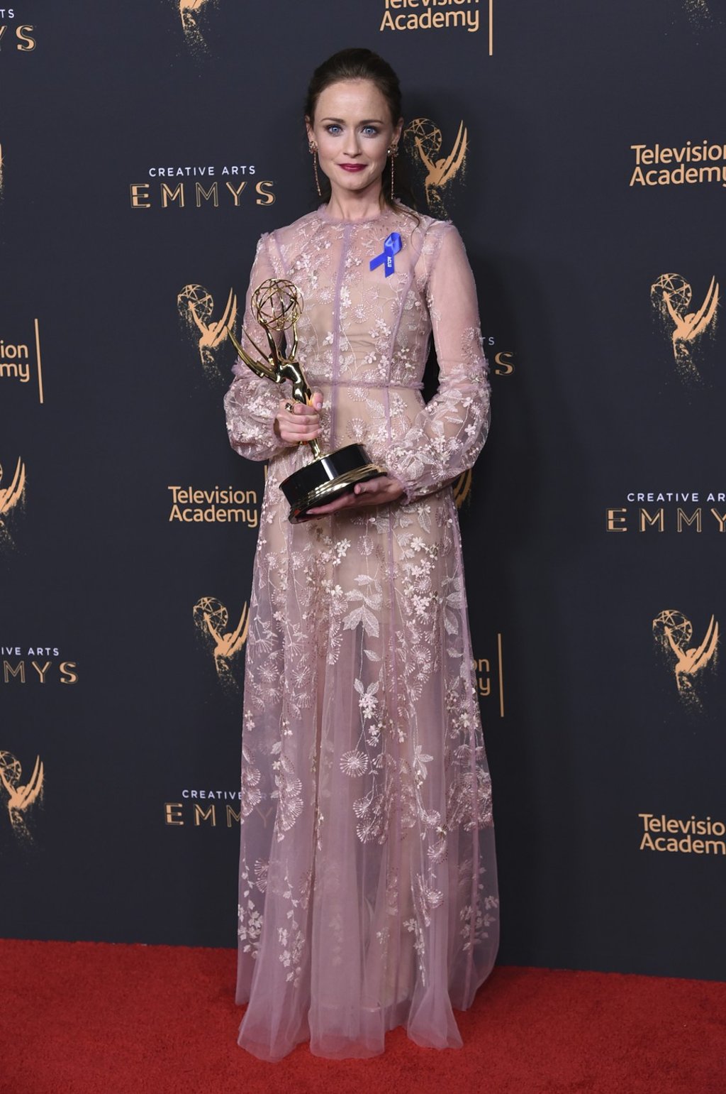Alexis Bledel poses in the press room with the award for outstanding guest actress in a drama series for ‘The Handmaid's Tale’ during night two of the Creative Arts Emmy Awards. Photo: AP Alexis Bledel poses in the press room with the award for outstanding guest actress in a drama series for ‘The Handmaid's Tale’ during night two of the Creative Arts Emmy Awards. Photo: AP