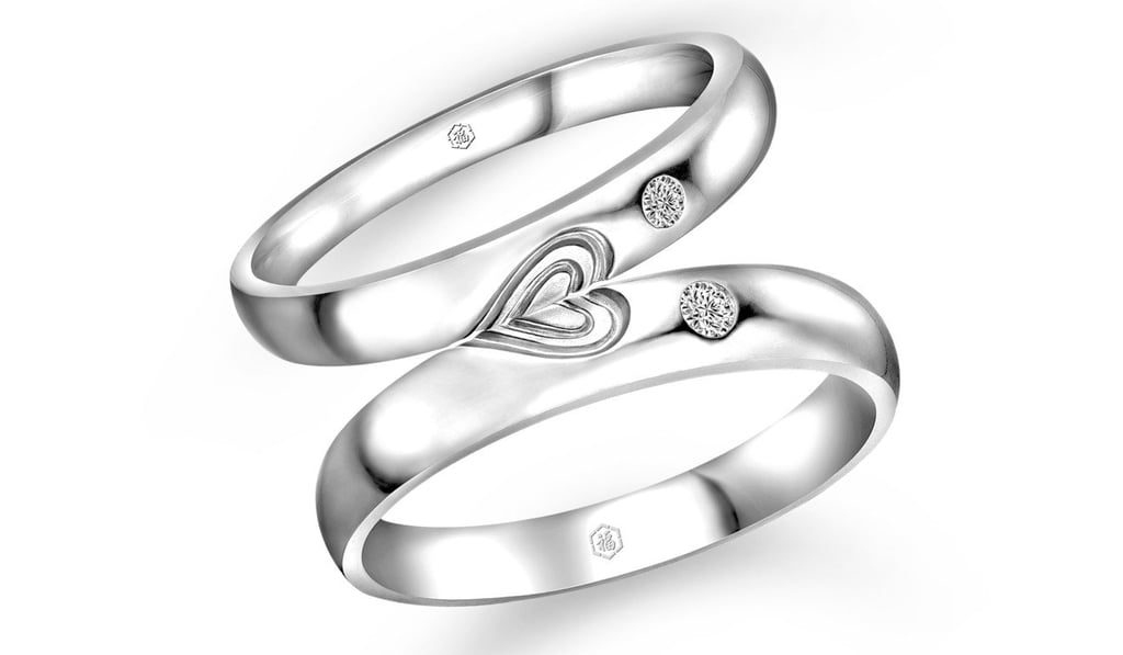 18ct white gold diamond engagement and wedding rings by Lukfook Jewellery. 18ct white gold diamond engagement and wedding rings by Lukfook Jewellery.