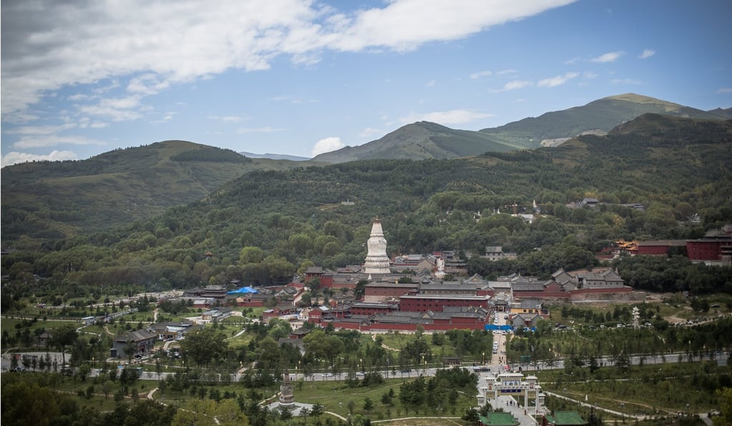 A general view of the Taihuai valley with the Great White Pagoda (centre) in Shanxi province’s Mount Wutai, considered a holy land of Chinese Buddhism. India and China share a common religion in Buddhism, which spread to China from India some 2,000 years ago. Photo: EPA-EFE A general view of the Taihuai valley with the Great White Pagoda (centre) in Shanxi province’s Mount Wutai, considered a holy land of Chinese Buddhism. India and China share a common religion in Buddhism, which spread to China from India some 2,000 years ago. Photo: EPA-EFE