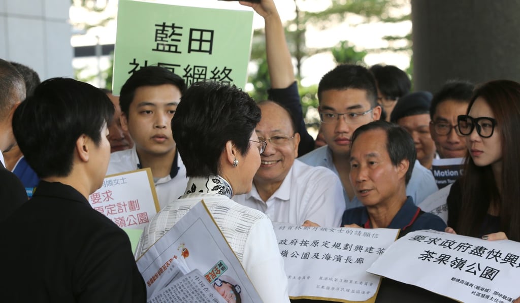 Lam receiving petition letters at government headquarters in Tamar on Tuesday. Photo: Sam Tsang