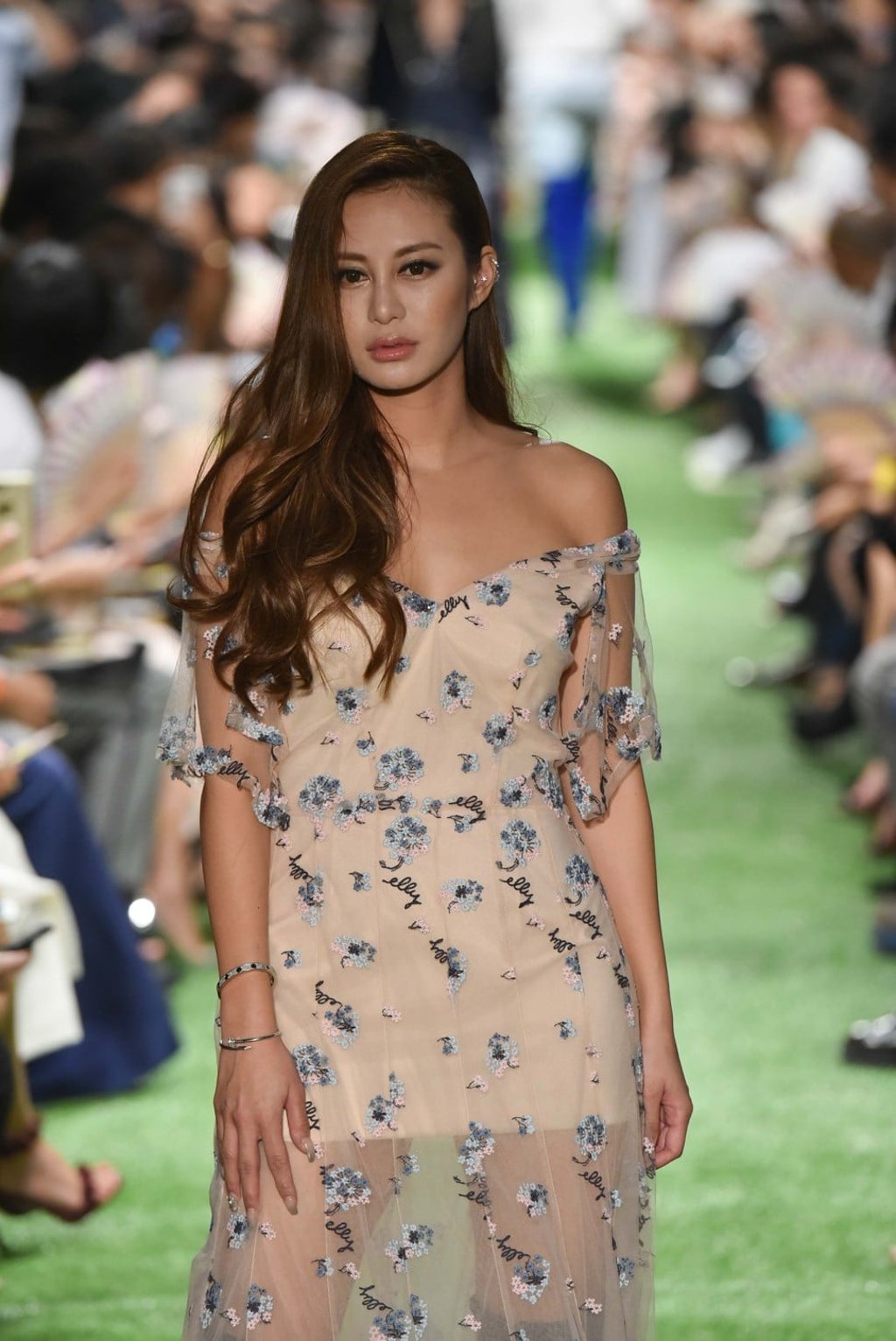 Insta-babe Elly Lam wore a nude embroidered mesh dress.