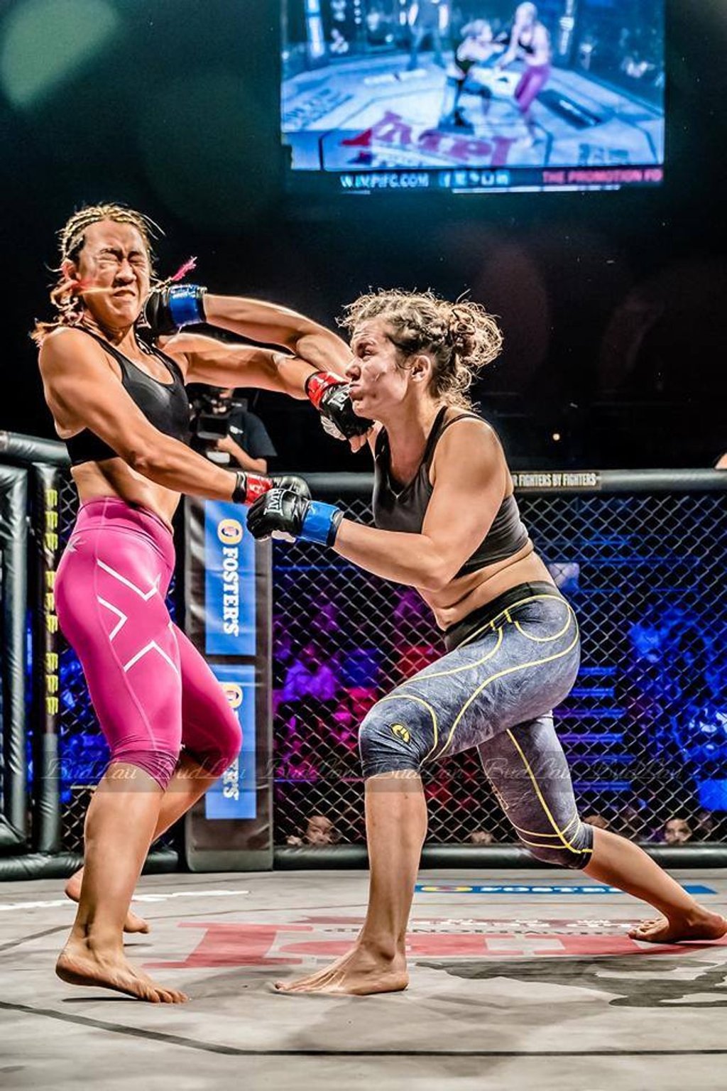 Carder (right) lands a blow on Tricia Yap in the first professional women’s cage fight held in Hong Kong – part of the IMPI2 World Series (Asia) – at Queen Elizabeth Stadium in 2015. Carder (right) lands a blow on Tricia Yap in the first professional women’s cage fight held in Hong Kong – part of the IMPI2 World Series (Asia) – at Queen Elizabeth Stadium in 2015.