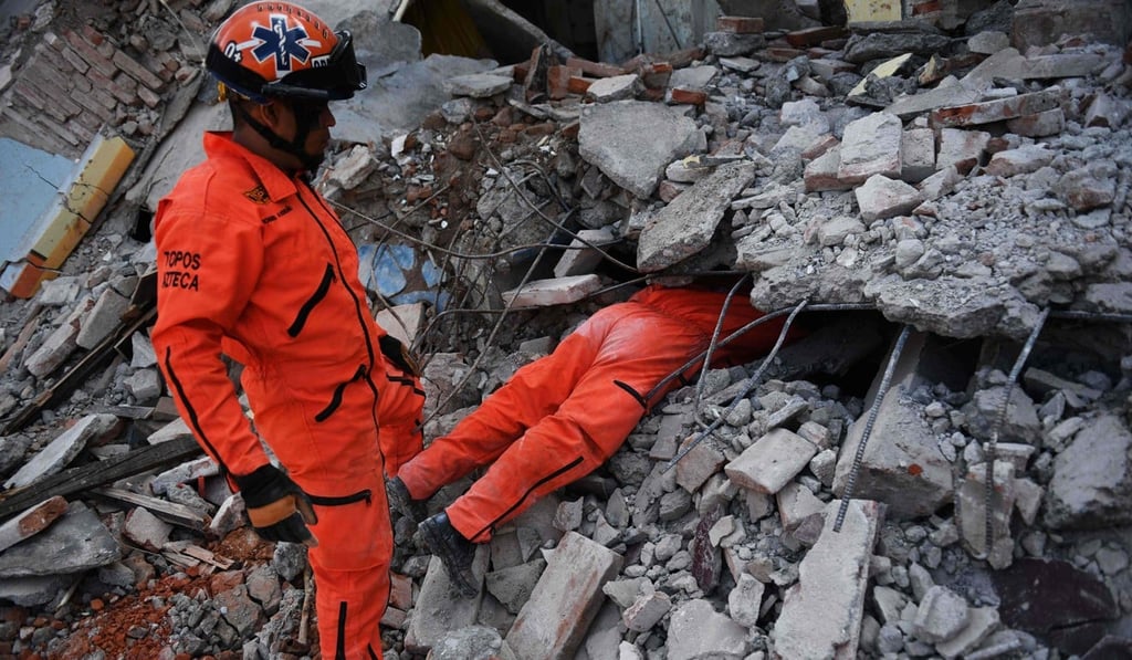 Members of Los Topos search for survivors in Juchitan de Zaragoza, Mexico, on September 9 after a powerful earthquake struck Mexico's Pacific coast on September 7. Now, they are in action again in Mexico City. Photo: AFP