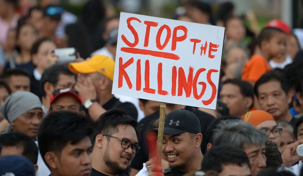 Demonstrators protesting against Philippine President Rodrigo Duterte raise their fists at recent rallies in Manila. But despite the public show of force, a recent survey has shown more than three-quarters of Filipinos support the president. Photo: AFP Demonstrators protesting against Philippine President Rodrigo Duterte raise their fists at recent rallies in Manila. But despite the public show of force, a recent survey has shown more than three-quarters of Filipinos support the president. Photo: AFP