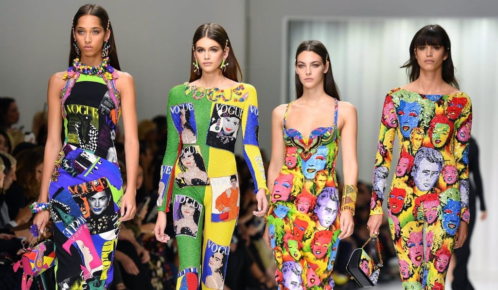Kaia Gerber (second left) and other models display Versace creations during Milan Fashion Week. Photo: EPA-EFE