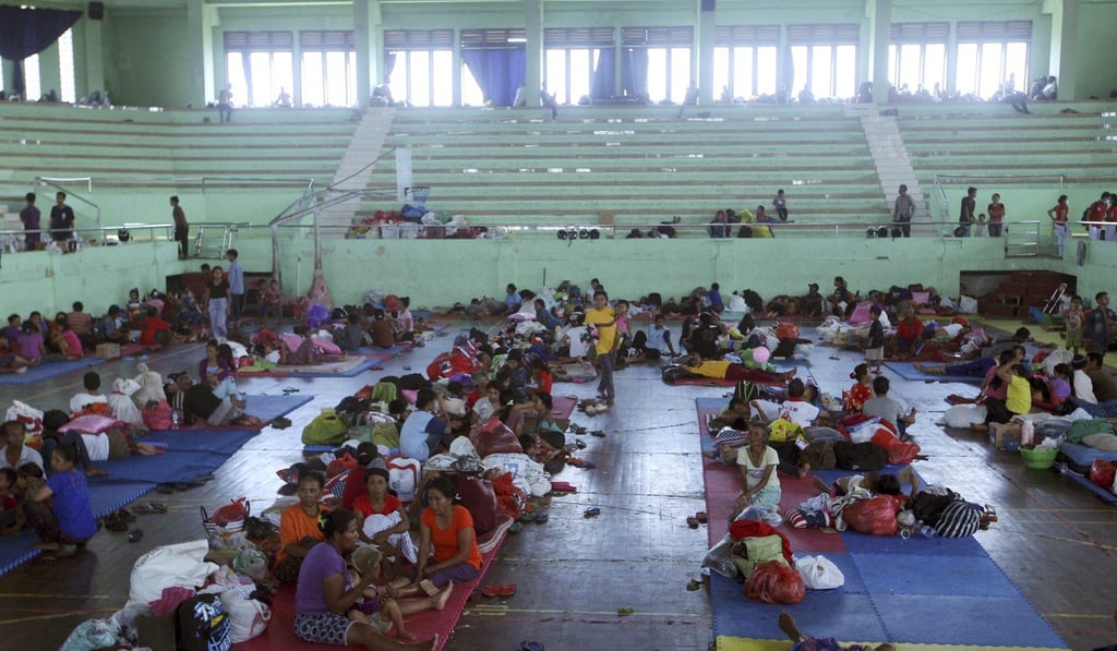 Villagers rest at a temporary shelter in Klungkung, Bali. Photo: AP Villagers rest at a temporary shelter in Klungkung, Bali. Photo: AP