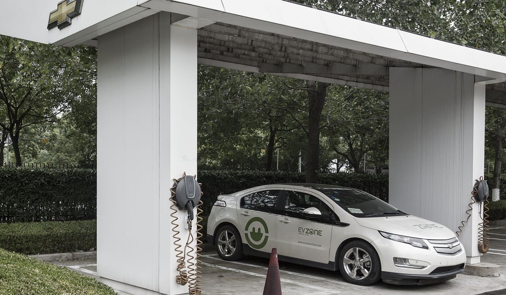 A General Motors Chevrolet Volt electric vehicle sits parked at a charging station at the General Motors China headquarters in Shanghai. Photo: Bloomberg
