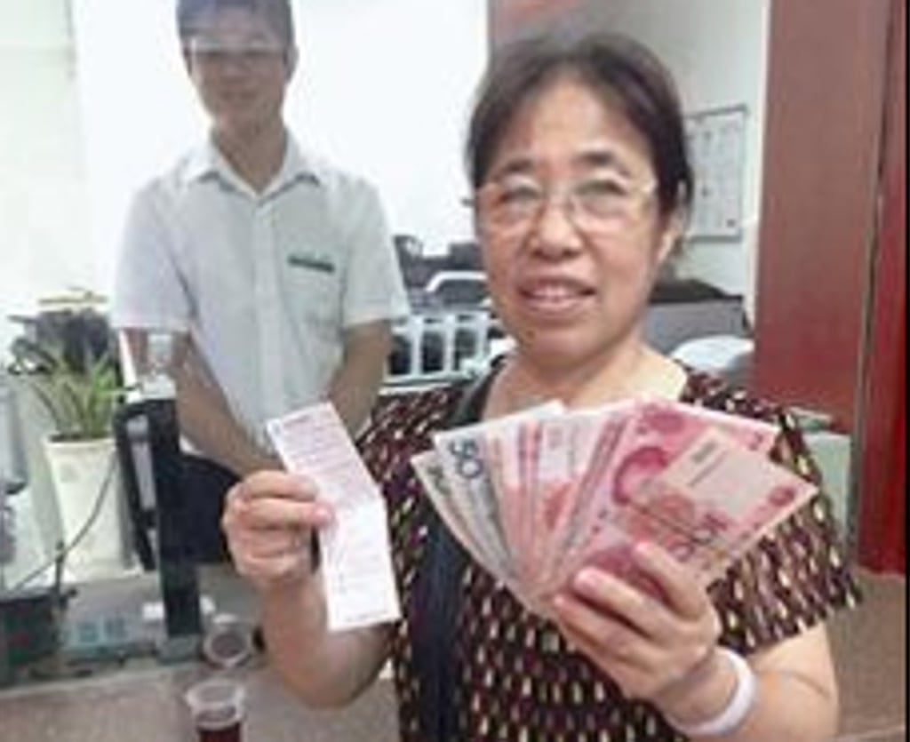 The woman, surnamed Chen, was disappointed to find her 1,200 yuan deposit had grown to just 2,684 yuan in 44 years. Photo: Handout