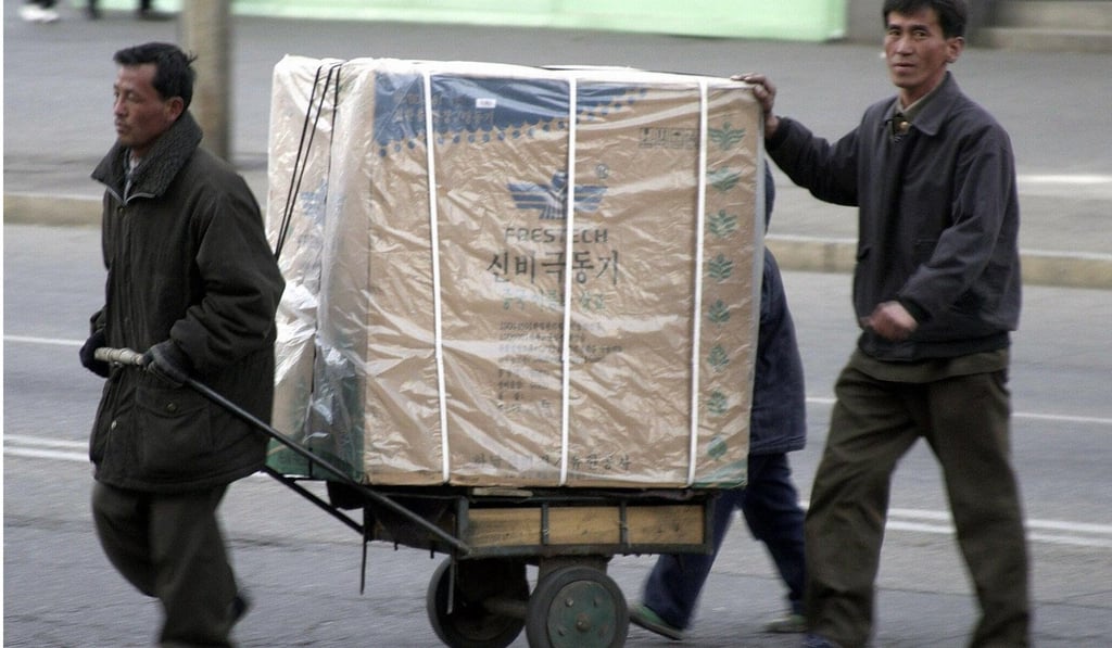 Private citizens have long run small businesses in North Korea, selling household goods, food and imported products in grey markets. Photo: EPA