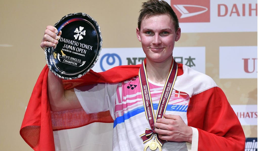 Viktor Axelsen shows off his spoils in Tokyo. Viktor Axelsen shows off his spoils in Tokyo.