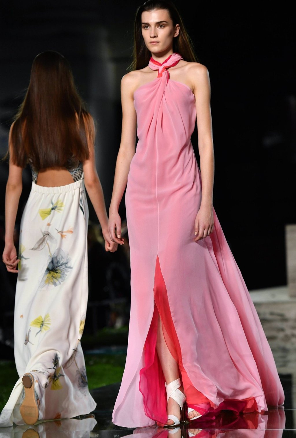 Foulards are twisted for a dramatic effect and used as straps on halter dresses . Photo: EPA Foulards are twisted for a dramatic effect and used as straps on halter dresses . Photo: EPA