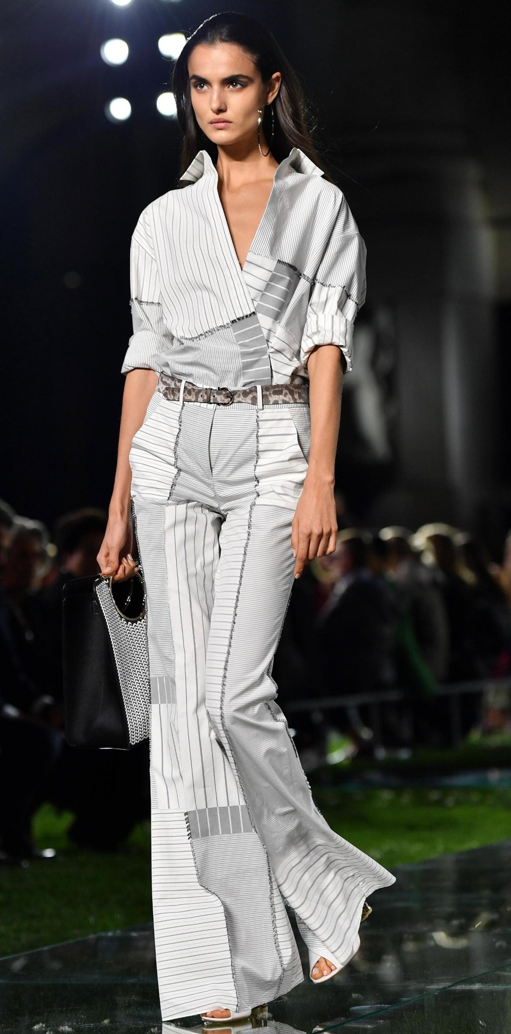 Prints are featured on shirts and flared trousers. Photo: EPA Prints are featured on shirts and flared trousers. Photo: EPA