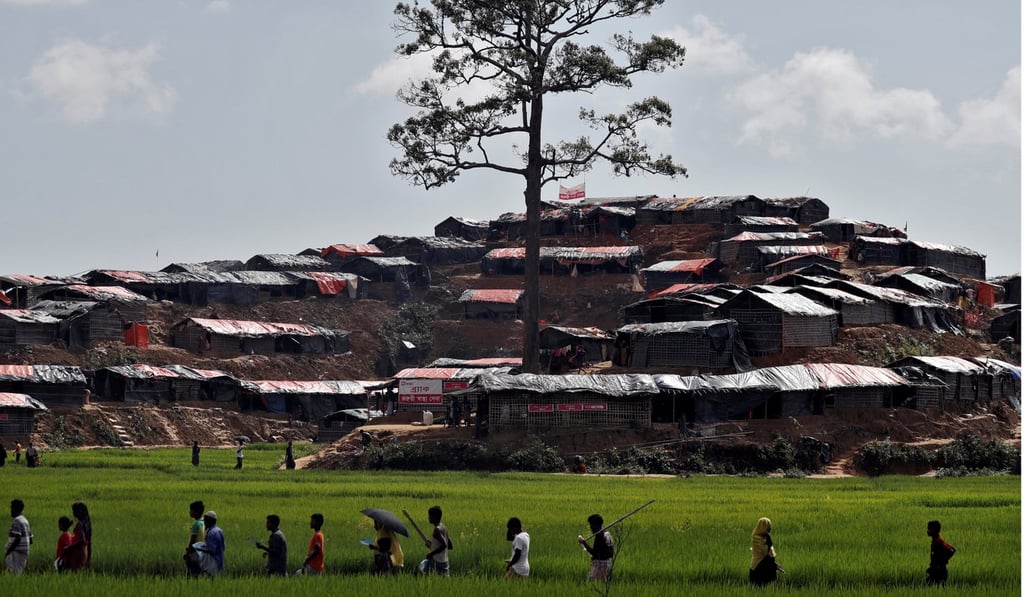 Rohingya refugees arrive at one of the many camps set up in neighbouring Bangladesh. Photo: Reuters