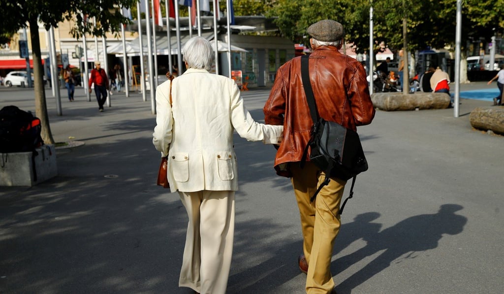 An elderly couple take a stroll in Lausanne, Switzerland, last week. Unless depression, dementia or mental health are factors, the elderly should be allowed to make health decisions for themselves. Photo: Reuters