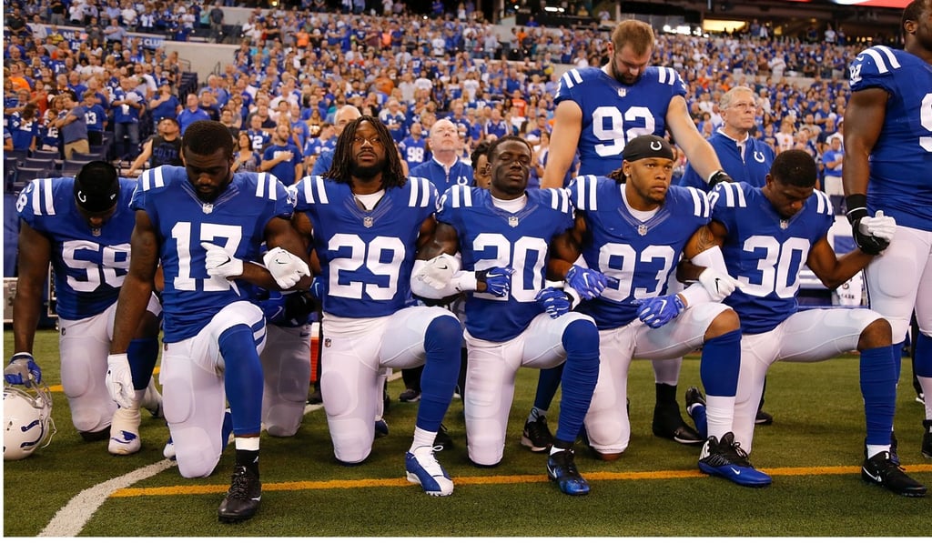 Members of the Indianapolis Colts kneel for the national anthem before the start of the game between the Indianapolis Colts and the Cleveland Browns in Indianapolis, Indiana on Sunday. Photo: AFP