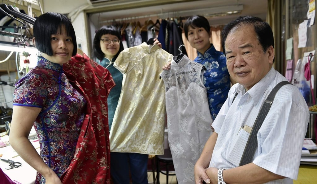 Lin Chin-te (right) with his students and some of their creations. Photo: AFP