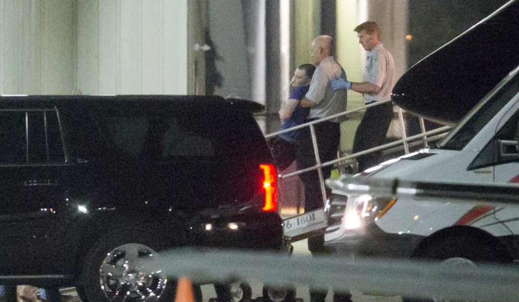 Otto Warmbie is carried off of an airplane at Lunken Airport in Cincinnati on June 13. Photo: AP
