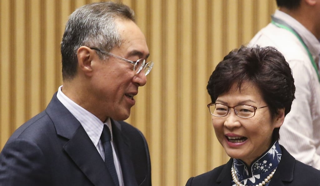 Hong Kong Chief Executive Carrie Lam Cheng Yuet-ngor with former chief secretary Henry Tang, after naming him as the new chairman of the West Kowloon Cultural District Authority, at the government headquarters in Tamar on September 18. Photo: David Wong