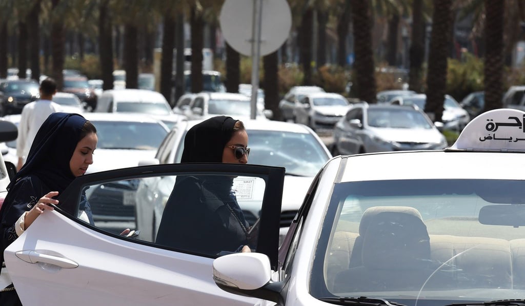 Saudi women get into a taxi on a street in the Saudi capital Riyadh. Photo: AFP