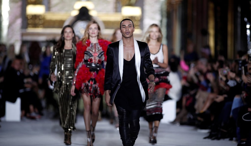 French fashion designer Olivier Rousteing appears at the end of his 2018 spring/summer ready-to-wear collection fashion show in Paris. Photo: REUTERS