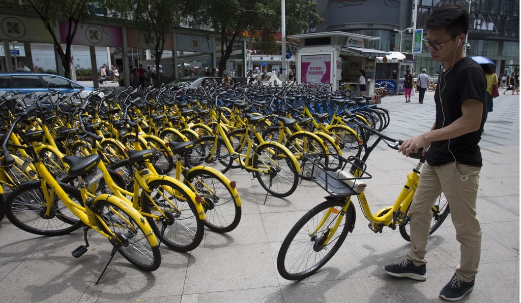 People use mobile payment systems to rent Ofo bikes in Shenzhen, China. Handout photo
