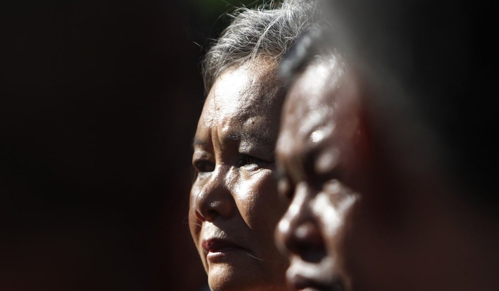 Opposition party lawmakers, Mu Sochua and Cheam Channy join supporters of jailed Cambodia National Rescue Party leader Kem Sokha at the country’s Court of Appeals. Photo: AP