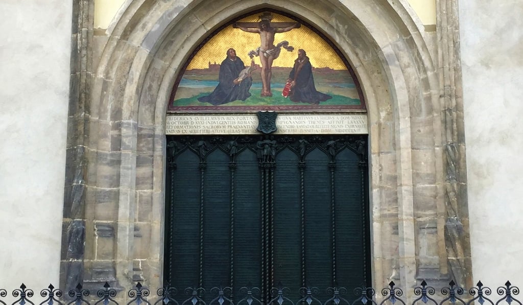 The doors of Castle Church in Wittenberg, where Martin Luther posted his 95 theses that questioned the Catholic Church and helped pave the way for the Protestant Reformation 500 years ago this October. Photo: TNS