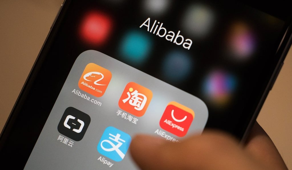 Icons for Alibaba Group applications, including Taobao, AliExpress, Alipay and AliCloud, are arranged on a smartphone display. Photo: Bloomberg