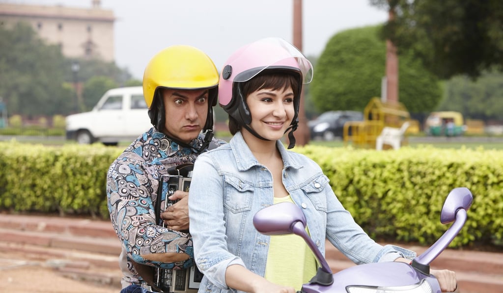 Aamir Khan and Anushka Sharma in a scene from another of his hit movies, PK.