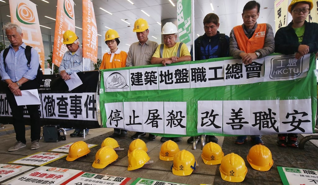 Concern groups and pan-democratic lawmaker Leung Yiu-chung (far left) protest outside the Legislative Council ahead of a manpower panel meeting on occupational safety in the construction of the Hong Kong-Zhuhai-Macau Bridge, on April 12. Ten workers have died and more than 600 have been injured in 275 incidents since work began on the bridge in 2011. Photo: David Wong