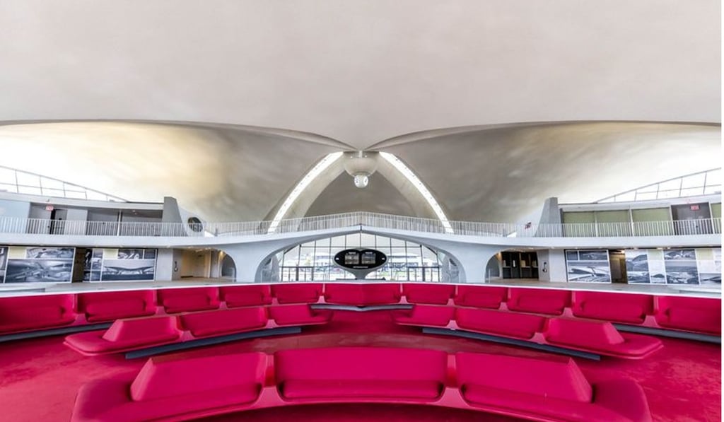 The sunken lounge in the TWA Hotel is a faithful restoration of the one designed in the 1960s. The sunken lounge in the TWA Hotel is a faithful restoration of the one designed in the 1960s.