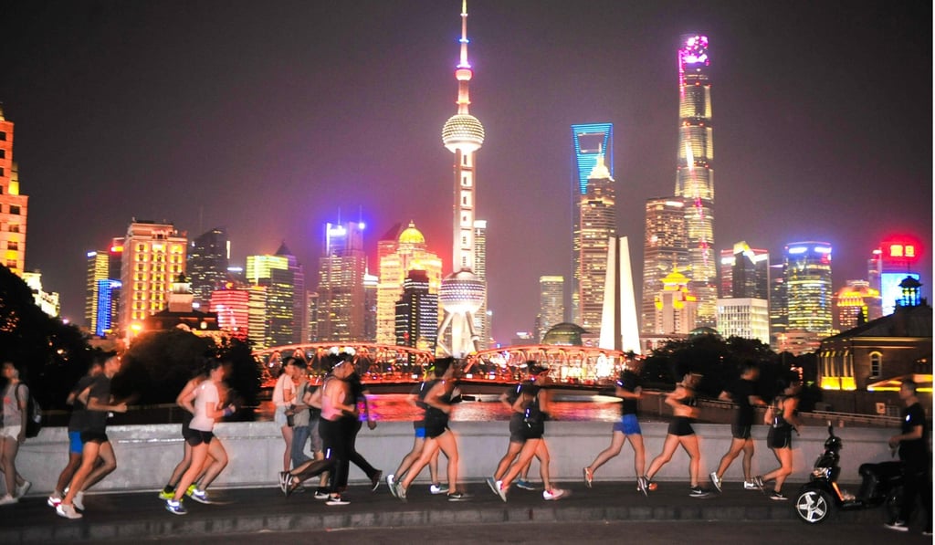 China’s economy is set to cool, ending a ‘golden window’ of opportunity for Hong Kong, according to Tao Dong of Credit Suisse. Photo: AFP