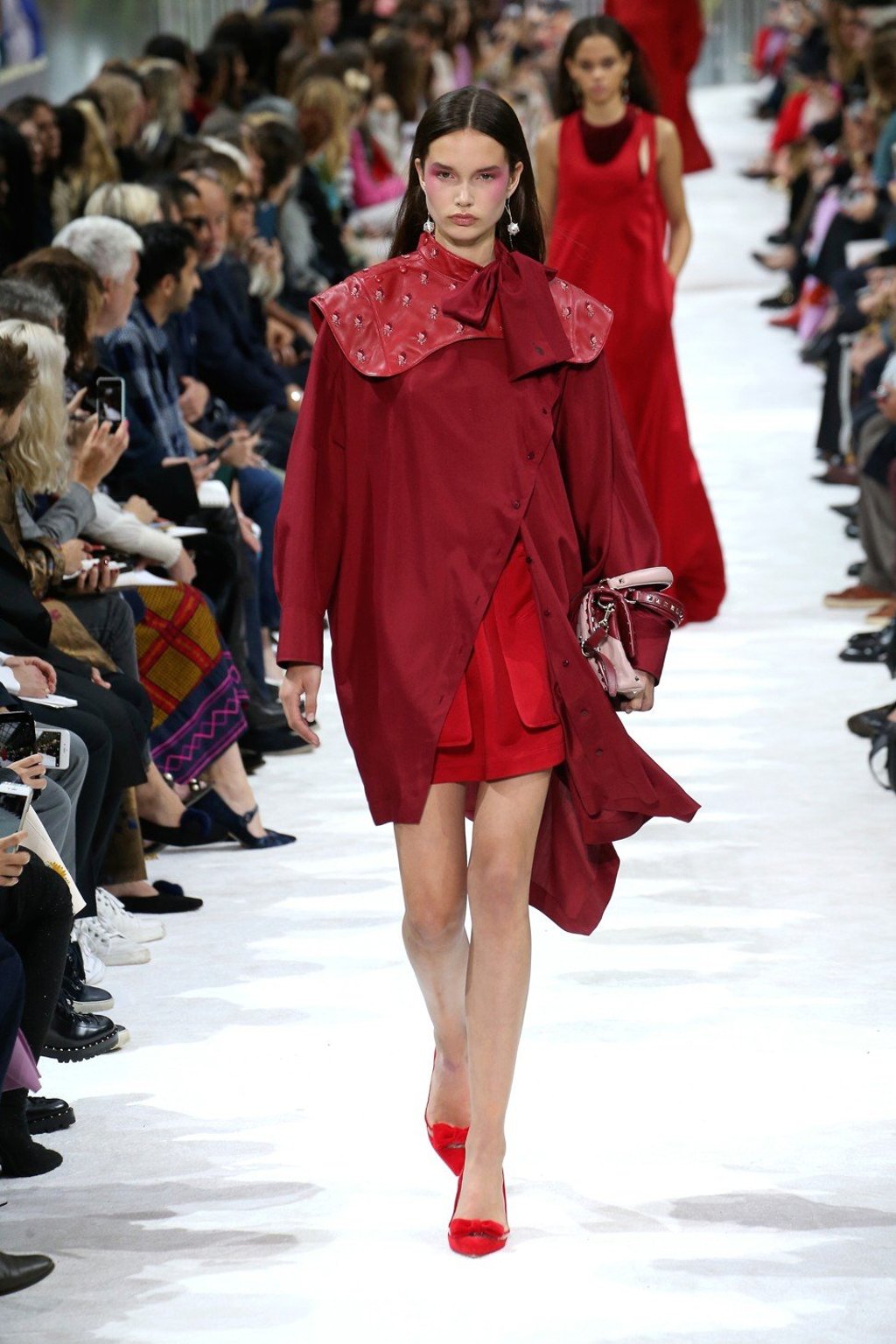 Red creations turn heads at the Valentino show. Photo: Xinhua