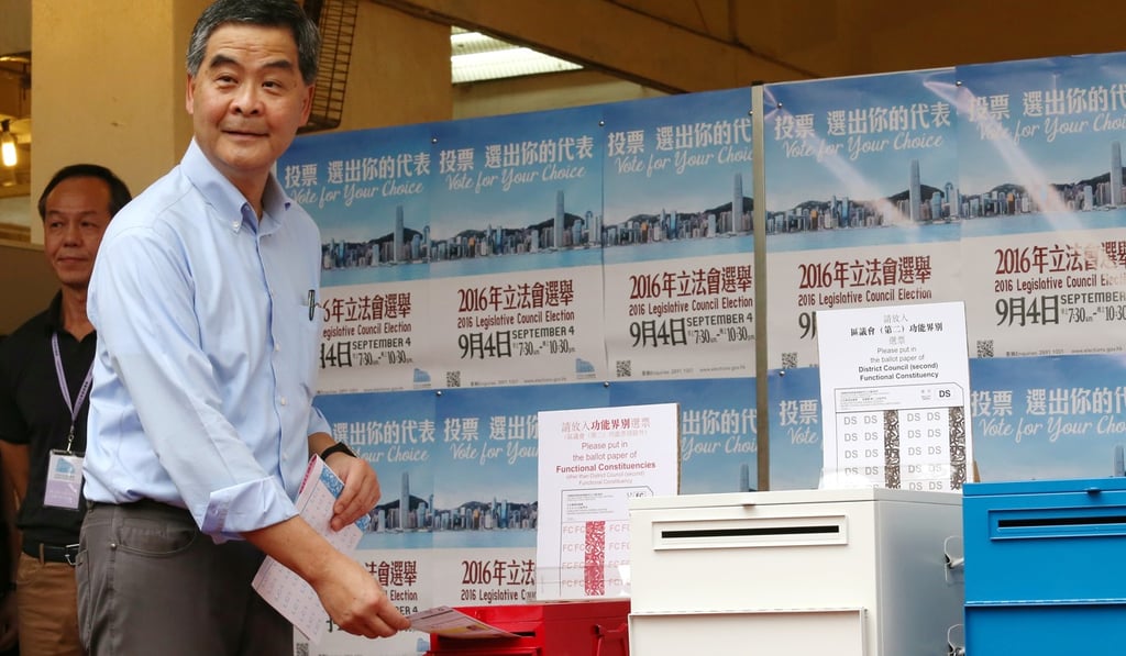 The sandwich stunt happened as Leung entered the polling station in Mid-Levels. Photo: K.Y. Cheng