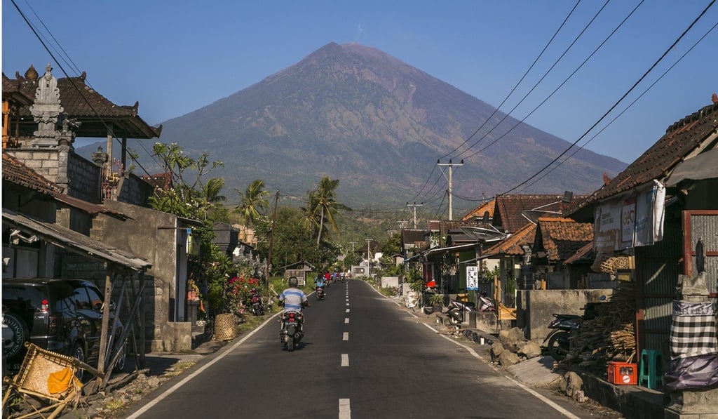 Mount Agung is one of just seven volcanoes in the world to have consecutive eruptions – as it did in 1843 and 1963. By Thursday night, more than 134,000 local residents had been evacuated from around the mountain as signs of an imminent eruption intensify. Photo: EPA