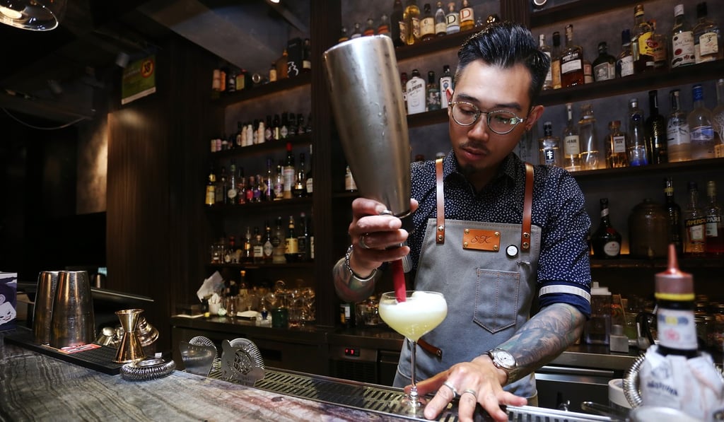 Bar manager Samuel Kwok from Quinary, making the Lavender Meringue Pie. Photo: SCMP / Jonathan Wong
