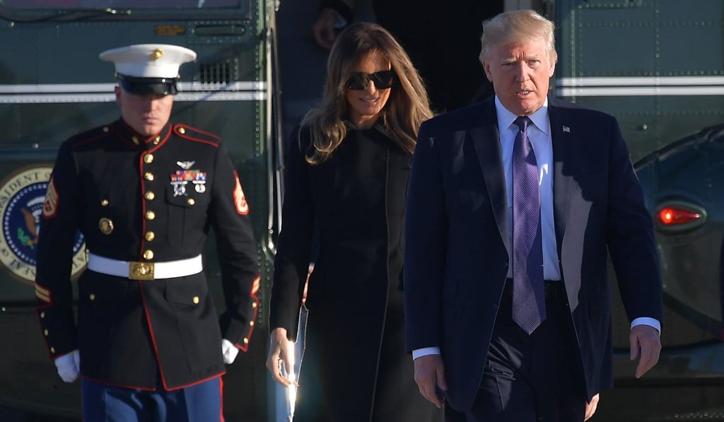 US President Donald Trump and first lady Melania Trump make their way to board Air Force One on their way to Las Vegas. Photo: AFP US President Donald Trump and first lady Melania Trump make their way to board Air Force One on their way to Las Vegas. Photo: AFP