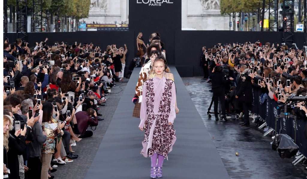 Model Adwoa Aboah walks on the Champs Elysees catwalk at L'Oreal’s Paris Fashion Week. Photo: Reuters