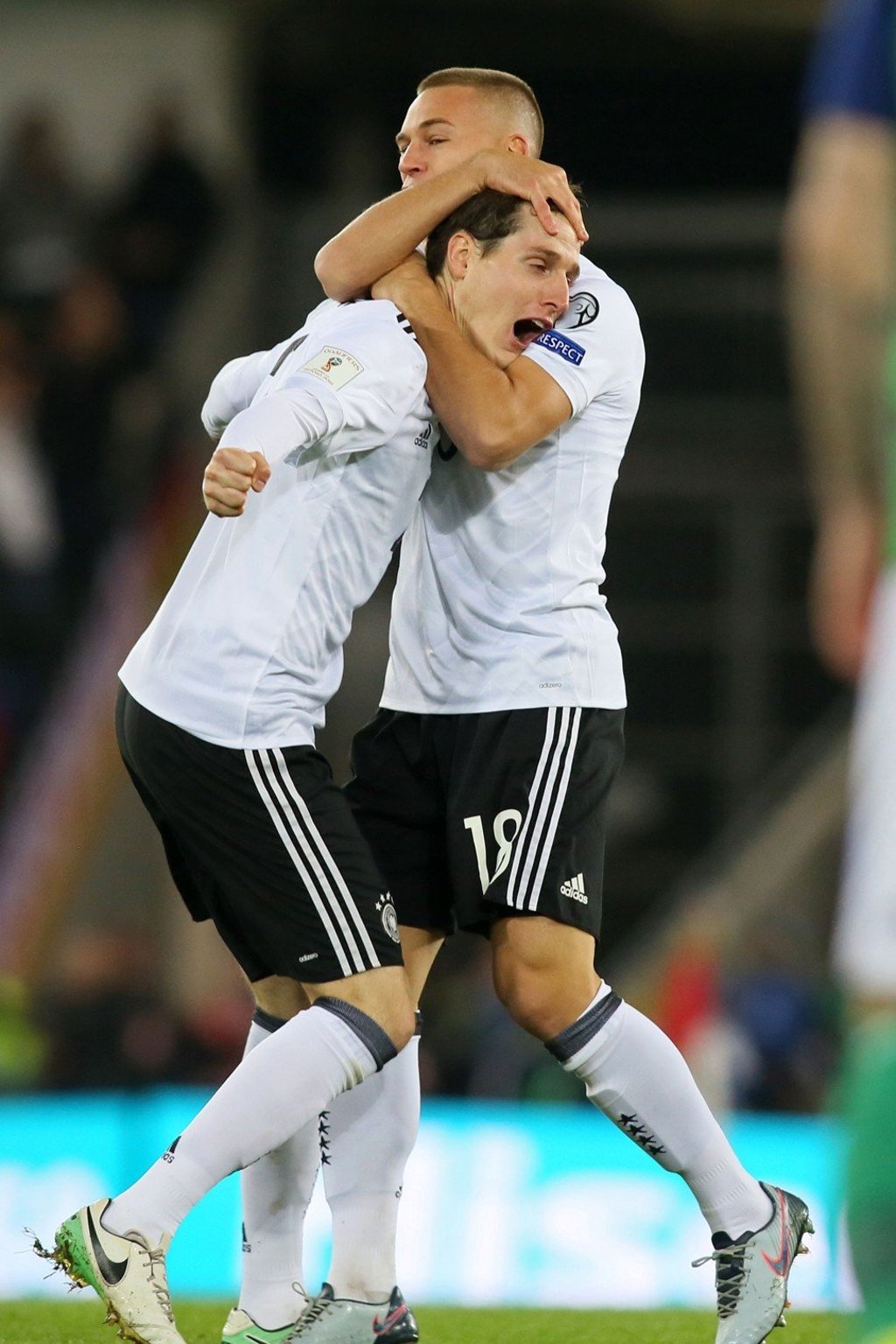 Germany's midfielder Sebastian Rudy (L) celebrates with Joshua Kimmich after scoring the opening goal. Photo: AFP
